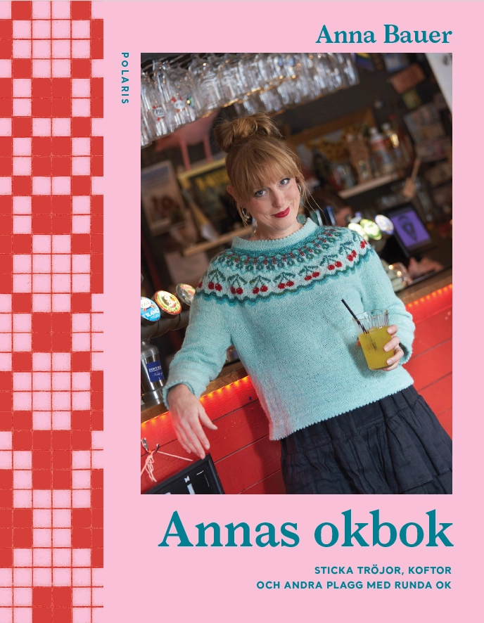 Omslag till Annas okbok där Anna Bauer står och lutar sig mot en bardisk.